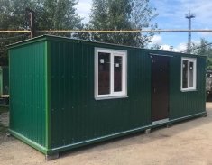 Бытовка зеленая с ЛДСП отделкой, центральный вход